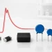 Through-hole, molded SMD and multilayer varistors shown with a controlled residual-voltage surge trace