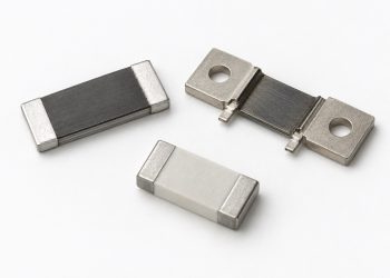Three unbranded low-ohmic current-sense resistors and shunts arranged naturally on a white background