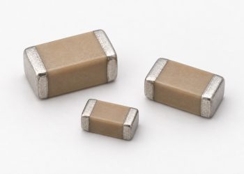 Three unbranded two-terminal MLCC ceramic capacitors arranged naturally on a white background