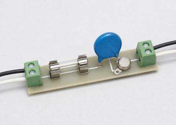 Line fuse, metal oxide varistor, and thermally coupled cutoff on a small circuit board