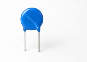 Blue radial-leaded disk MOV on a white background