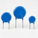 Three unmarked blue disk MOVs arranged naturally on a white background