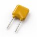 Unbranded yellow radial-leaded PPTC resettable fuse on a white background